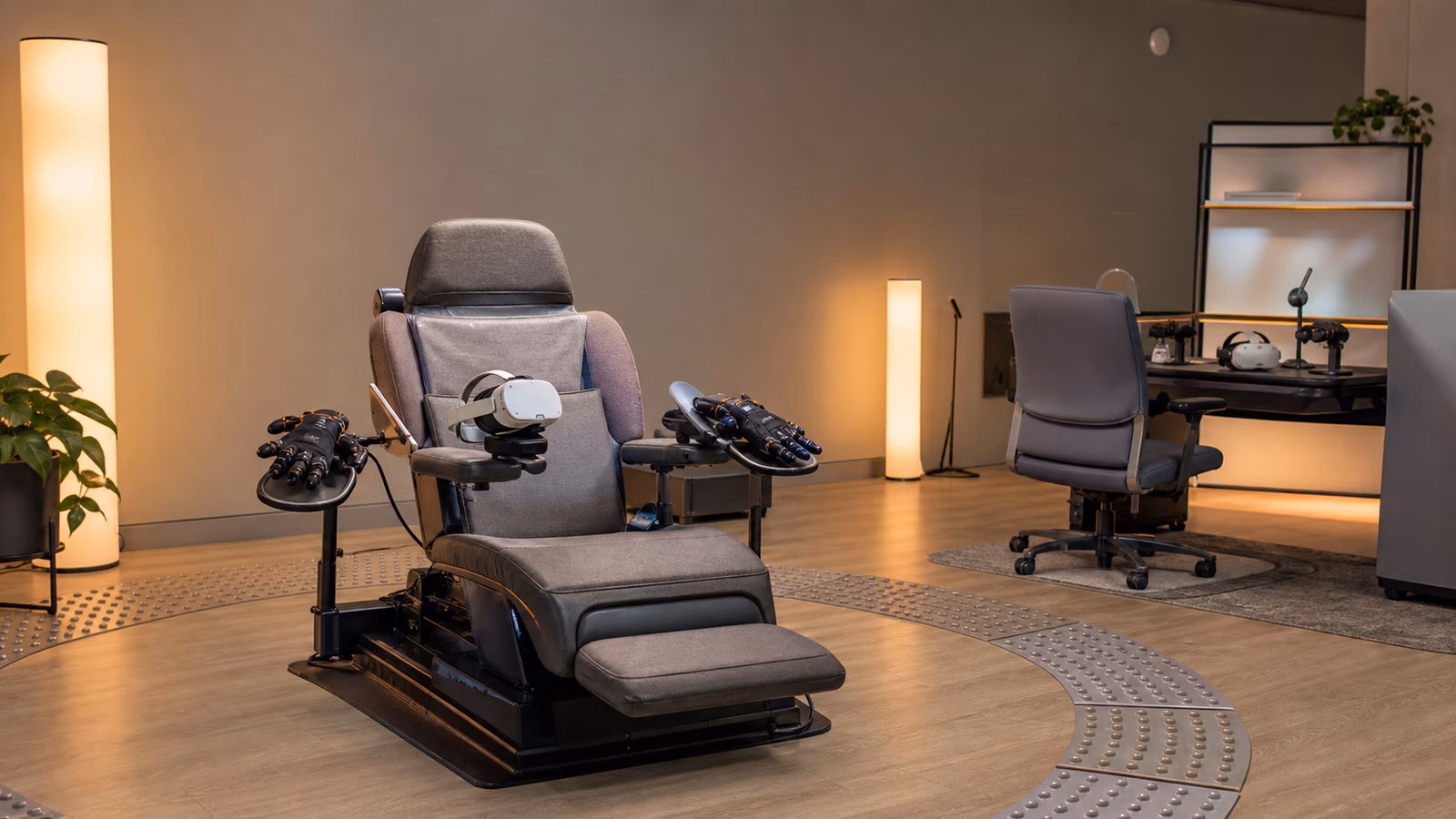 An accessible full dive VR preparation room with an adjustable chair, headset, haptic gloves, and tactile floor boundary.