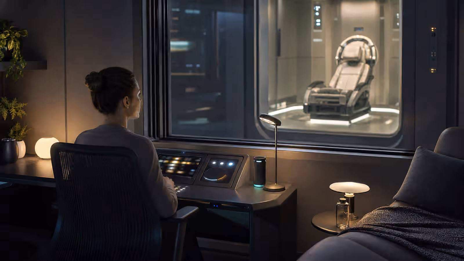 A calm facilitator station beside an unoccupied full dive VR immersion chair.
